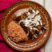 Carnitas with Orzo and Peppers in Red Mole Sauce