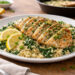 Lemon Garlic Chicken with Herbed Couscous and Greens