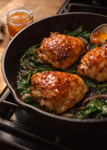 Pan-Roasted Chicken Thighs with Apricot Glaze and Greens