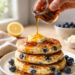 Lemon Ricotta Blueberry Cottage Pancakes with Maple Drizzle