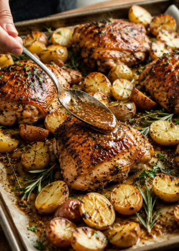 Herb-Roasted Chicken Thighs with Mustard-Glazed New Potatoes