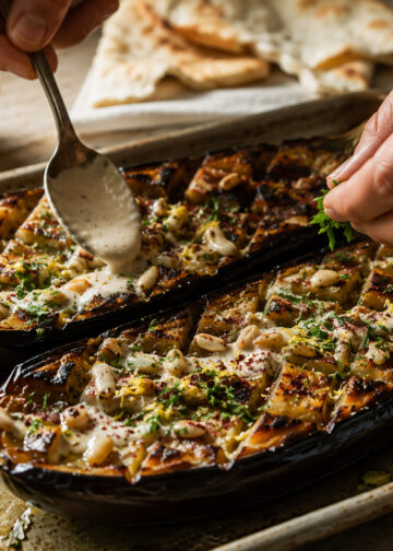 Charred Garlic-Tahini Roasted Eggplant with Toasted Pine Nuts